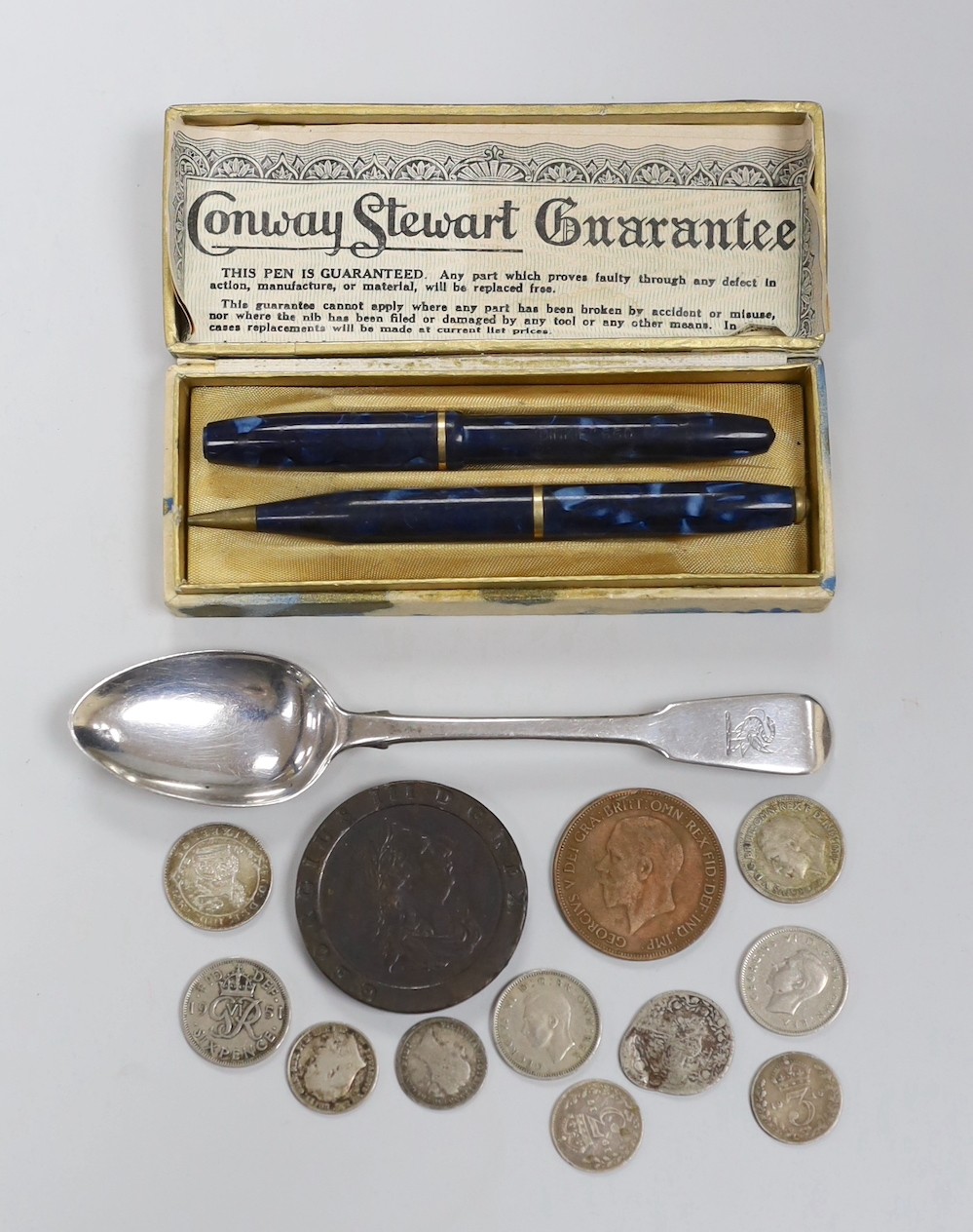 A George III cartwheel twopence other coinage, a boxed Conway Stewart pen and pencil set and Georgian silver spoon